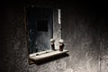 Dirty mirror in dark jail cell Royalty Free Stock Photo