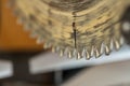 Dirty miter saw blade close up macro shot