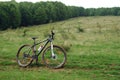 Dirty mountain bike in the forest. mud on bicycle tires Royalty Free Stock Photo