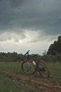 Dirty mountain bike in the forest. mud on bicycle tires Royalty Free Stock Photo