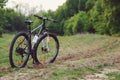 Dirty mountain bike in the forest. mud on bicycle tires Royalty Free Stock Photo