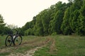 Dirty mountain bike in the forest. mud on bicycle tires Royalty Free Stock Photo