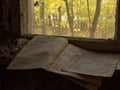 Dirty notebook with notes against the window in the abandoned kindergarden in Chernobyl Exclusion Zone.