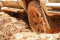 Dirty offroad car, SUV covered with mud on countryside road, Off-road tires, offroad travel and driving concept