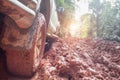 Dirty offroad car, SUV covered with mud on countryside road, Of