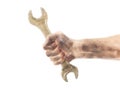 Dirty and oily hand holding wrench tool Royalty Free Stock Photo