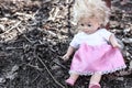 Dirty old abandoned doll Royalty Free Stock Photo