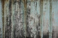 Dirty old green weathered painted wall as background Royalty Free Stock Photo