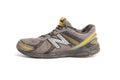 Dirty old New Balance 470 v3 running trainers with holes in on a white background