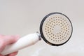 Dirty old shower head close up with limescale and calcified, rusty shower mixer and mould tiles on background, cleaning Royalty Free Stock Photo