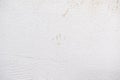 Dirty old stucco concrete wall with stain. Cat fingerprint or paw print stains on wall. Royalty Free Stock Photo