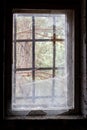 Dirty old window with broken glass and bars in abandoned house in ghost town Pripyat, Chernobyl Exclusion Zone, Ukraine Royalty Free Stock Photo