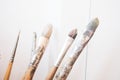 Dirty paintbrushes for painting isolated on white Royalty Free Stock Photo
