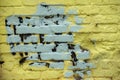 Dirty painted brick on damaged wall, abstract background from painted yellow grey brick wall, texture, urban background