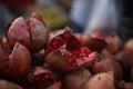 Dirty Pomegranate selling on the road. Royalty Free Stock Photo