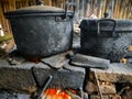 Dirty pots blackened by wood-burning smoke. Indonesian traditional cookware