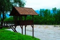 Dirty river current after rain. Mudslide concept. River flow with dirty water after heawy rain Royalty Free Stock Photo