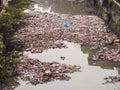 Dirty river in Dharavi slums. Mumbai. India. Royalty Free Stock Photo