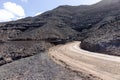 Dirty road leading to Cofete beach in Fuerteventura. Canary Islands Royalty Free Stock Photo