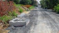 Dirty road under construction and drain pipe Royalty Free Stock Photo