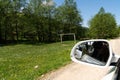 Dirty rural road in field, meadow, countryside. View from car window Royalty Free Stock Photo