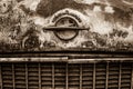 Dirty and rusty hood emblem of Opel Olympia Rekord Caravan.