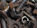 Dirty and rusty nuts and bolts close-up. Royalty Free Stock Photo