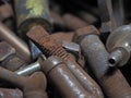 Dirty and rusty nuts and bolts close-up. Royalty Free Stock Photo