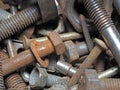 Dirty and rusty nuts and bolts close-up. Royalty Free Stock Photo