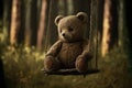 Lonely abandoned old teddy bear on swing with rusty chains Royalty Free Stock Photo