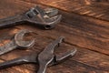 Dirty set of hand tools on a wooden boards Royalty Free Stock Photo