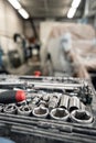 Dirty set of hand tools and wrenchs close-up in box. Garage painting car service. Tool to repair the car or replace Royalty Free Stock Photo