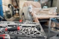 Dirty set of hand tools and wrenchs close-up in box. Garage painting car service. Tool to repair the car or replace Royalty Free Stock Photo