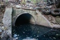 Dirty sewage exits from sewer tunnel Royalty Free Stock Photo