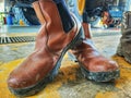 dirty shoes at work during the day Royalty Free Stock Photo