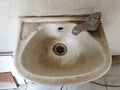 a dirty sink with lots of germs, rarely used