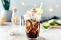 Dirty Soda with Cream Topping and Lime in Tall Glass Royalty Free Stock Photo