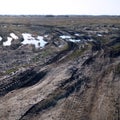 Dirty spring road. Impassability and mudslides Royalty Free Stock Photo