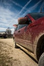 Dirty SUV on a mountain road Royalty Free Stock Photo