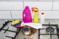 Dirty, top of the gas stove with bits of food. House cleaning Royalty Free Stock Photo