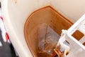 Dirty unhygienic rusty and calcified flush tank of toilet with limescale and rust stains and scum close up need to be cleaned and Royalty Free Stock Photo