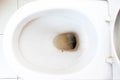 Dirty unhygienic toilet bowl with limescale stain at public restroom close up Royalty Free Stock Photo