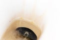 Dirty unhygienic toilet bowl with limescale stain at public restroom close up Royalty Free Stock Photo