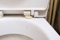 Dirty unhygienic toilet bowl with limescale stain at public restroom close up Royalty Free Stock Photo