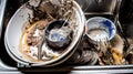 Dirty unwashed dishes with leftover food. Kitchen interior, sink. AI generated. Royalty Free Stock Photo