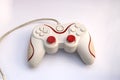 Dirty Used Wired Gamepad Controller with White and Red Accent Isolated in White Background Royalty Free Stock Photo