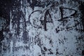 A dirty wall with a ACAB word written on a grunge area