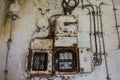 Electrical cabinet in old, abandoned workshop Royalty Free Stock Photo