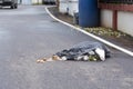 Dirty waste piles fall on the street, throwing away things without discipline