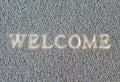 Dirty welcom doormat Royalty Free Stock Photo
